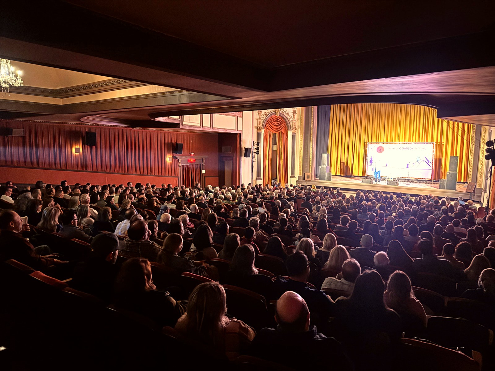 Packed theatre audience watching a Catskills Comedy Festival show